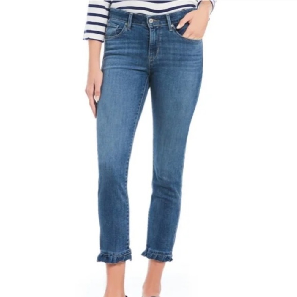 Levi’s mid rise skinny jeans with a ruffle on the bottom
